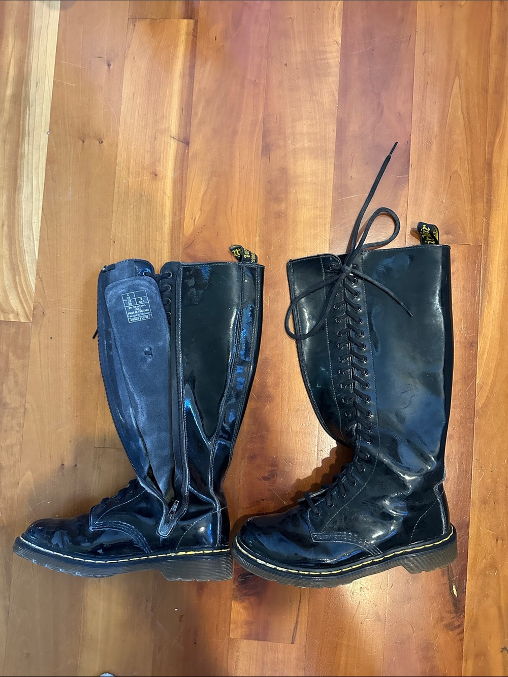 Dr. Martens Black Patent Leather Tall Lace-Up Combat Boots